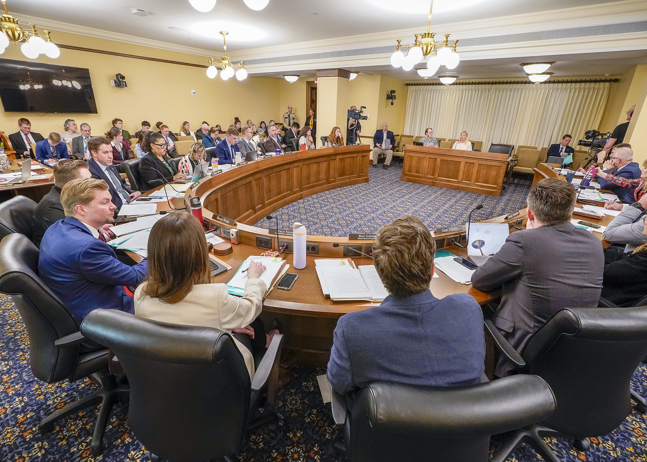 The House Rules and Legislative Administration Committee listens to public testimony April 15 on a resolution regarding impeachment investigations of state officers. (Photo by Andrew VonBank)